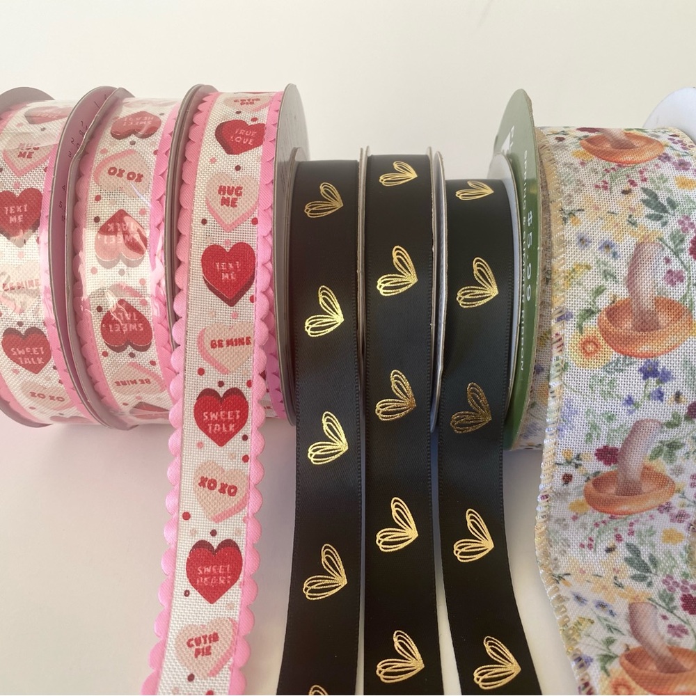 Ribbon assortment Celebrate It Black Ribbon with Gold Heart Design. Hearts.